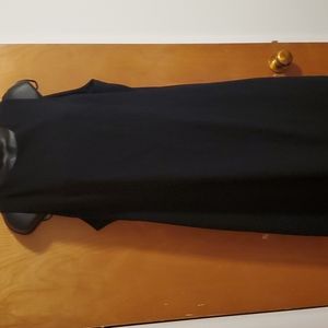 Sleeveless black sheath dress